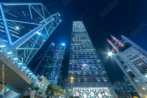 Photography Skyscraper in downtown district of Hong Kong city at night