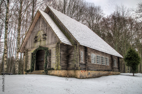 Wooden church in Usma, Latvia photo