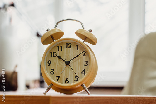 Mechanical alarm clock. Desk clock. Time symbol.