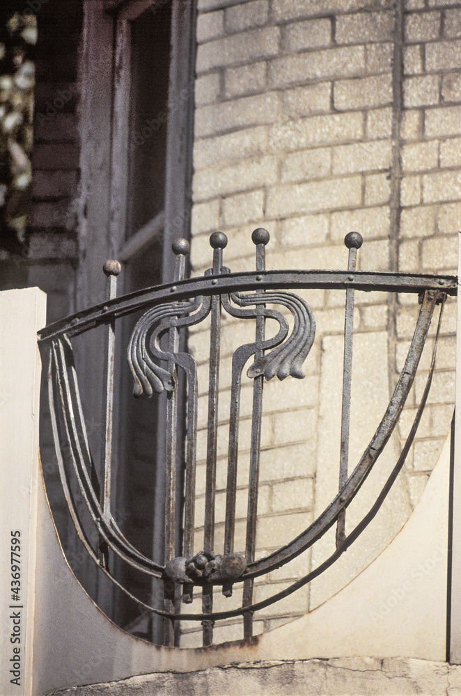 Old wrought iron balcony with decorative elements. Old wrought iron balcony with decorative elements.