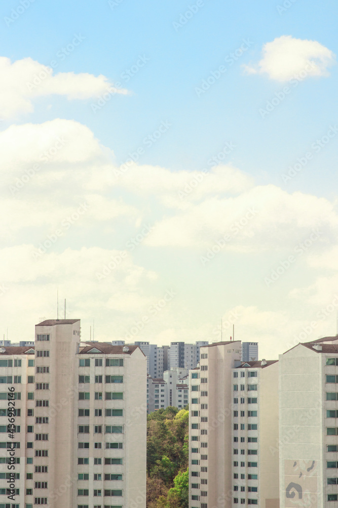 Apartment building with blue sky background