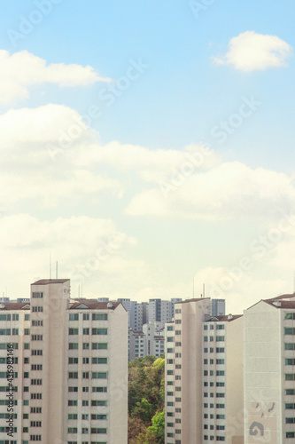 Apartment building with blue sky background