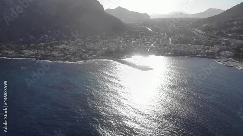 Mondello Barcarello Marina aerial: Hazy spectral morning light sunbeam photo