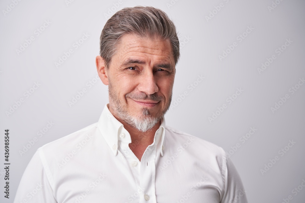 Portrait of happy smiling mid adult man