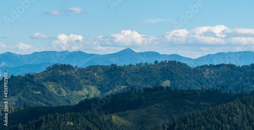 Mala Fatra mountains between Poludnovy grun and Maly Krivan hills from view tower above Zborov nad Bystricou village in Slovakia photo