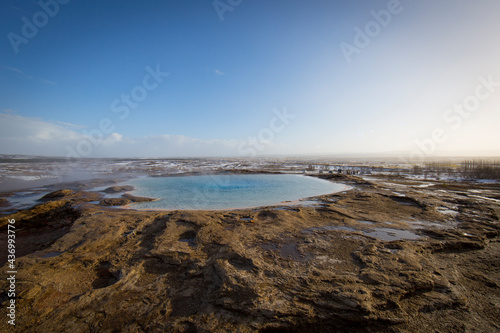 geyser in iceland, the water is colored by algae