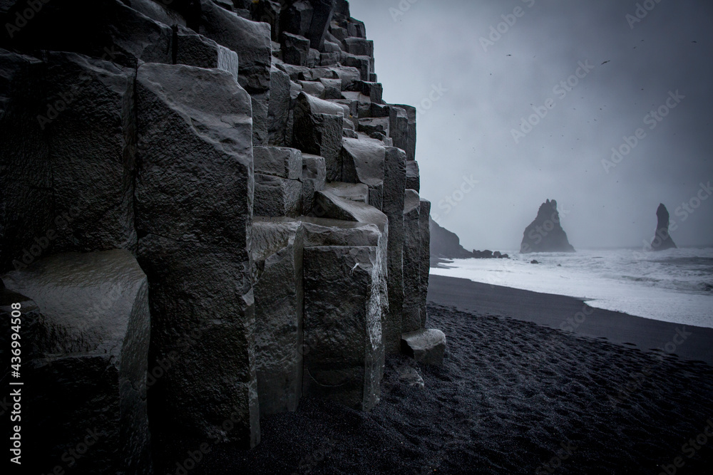 black sand beach in Iceland located in Reynisfjara Beach, Iceland