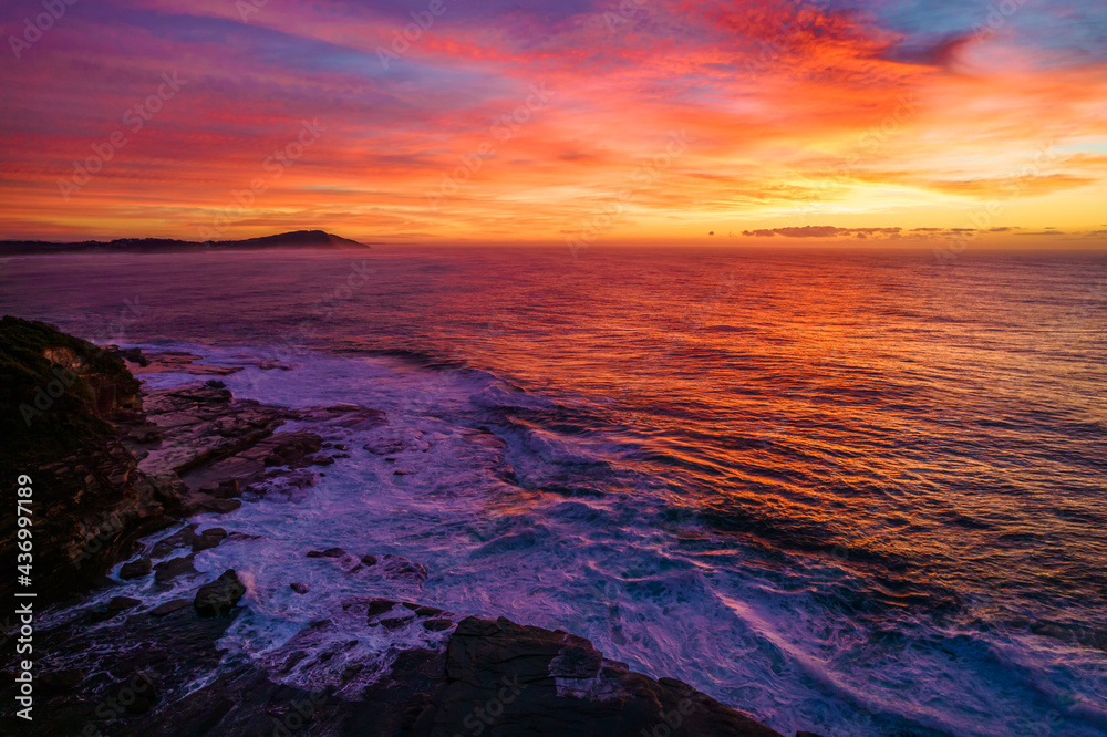 Aerial Sunrise Seascape at Rocky Inlet with colourful high cloud