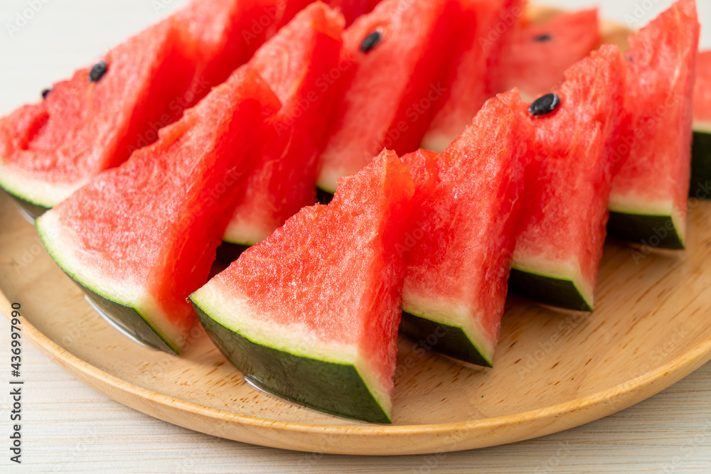 fresh watermelon sliced on plate fresh watermelon sliced on plate