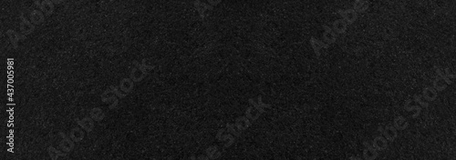 Panorama of Black polished sandstone wall texture and seamless background