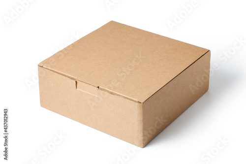 Brown cardboard box isolated on white background. © koosen