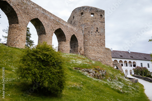 Gothic medieval castle Velhartice in sunny day  tower and stone arch bridge  fortress masonry wall  old stronghold  Velhartice  National Park Sumava  South Bohemia  Czech Republic