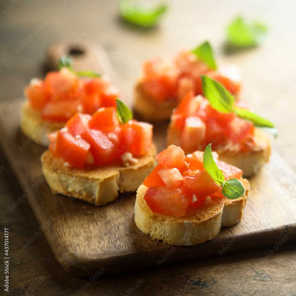 Traditional homemade bruschetta with tomato and basil	