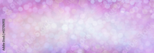 Feminine lilac pink wide bokeh background banner - plenty of space for copy unsymmetrical bokeh effect background ideal for celebration messages 