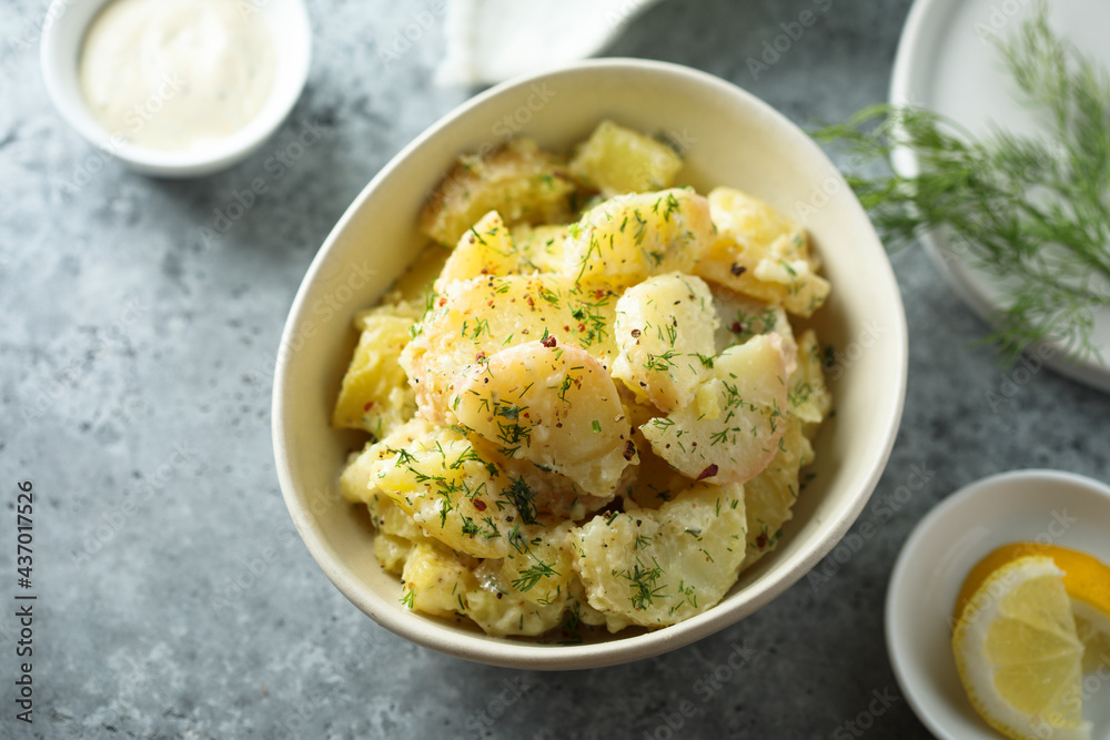 Traditional homemade potato salad with herbs Traditional homemade potato salad with herbs
