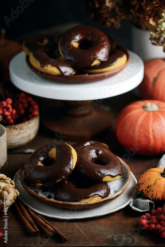Pumpkin donuts with nutella glaze.