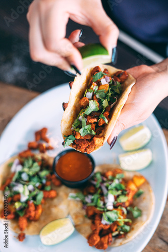 A plate of tacos and tortilla