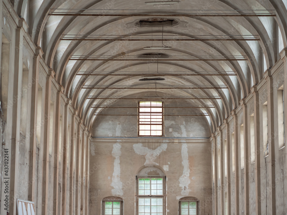 Empty White Interiors without People in an old Hospital Building in Parma, Italy