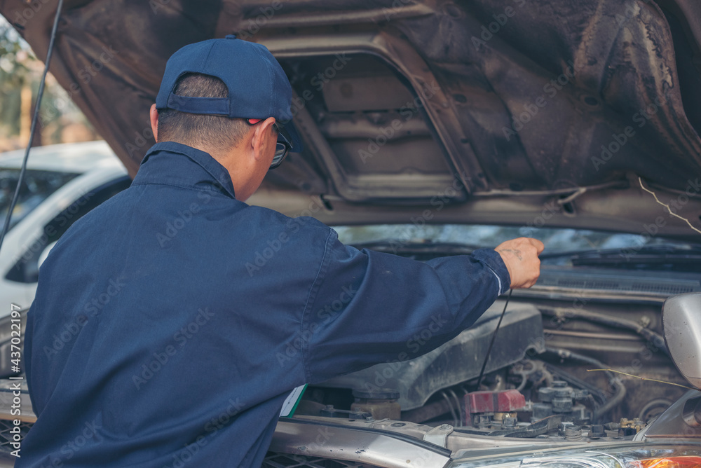 Mechanic car service auto garage in automotive mobile center. Technician workshop repair engine motor vehicles service mechanical engineering business. Automobile mechanic hands car repairs technic