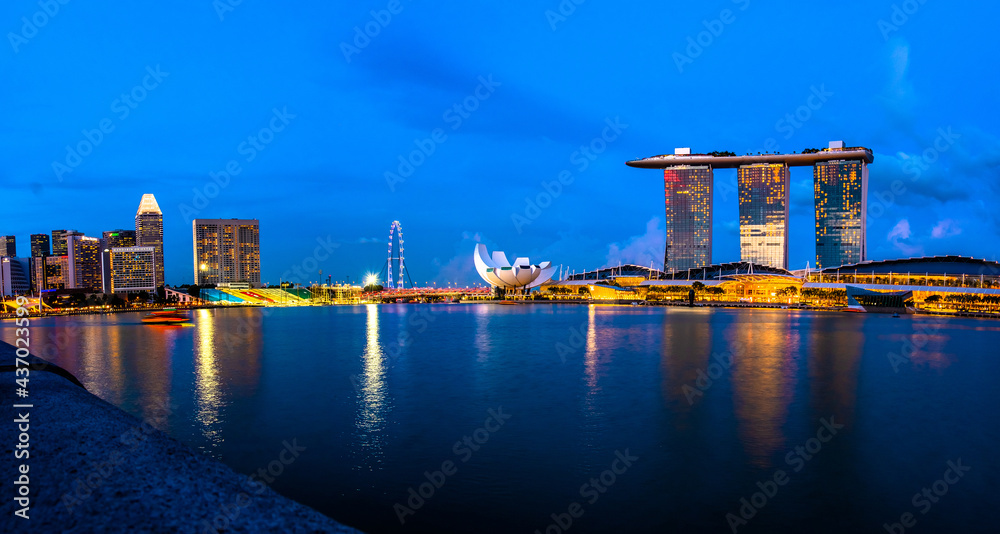 Singapore city skyline at Marina bay cityscape by night