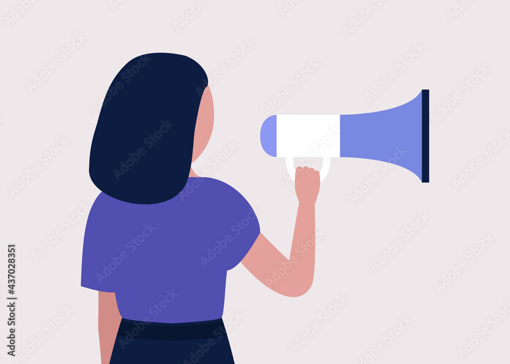 Young woman speaks into a megaphone Young woman speaks into a megaphone