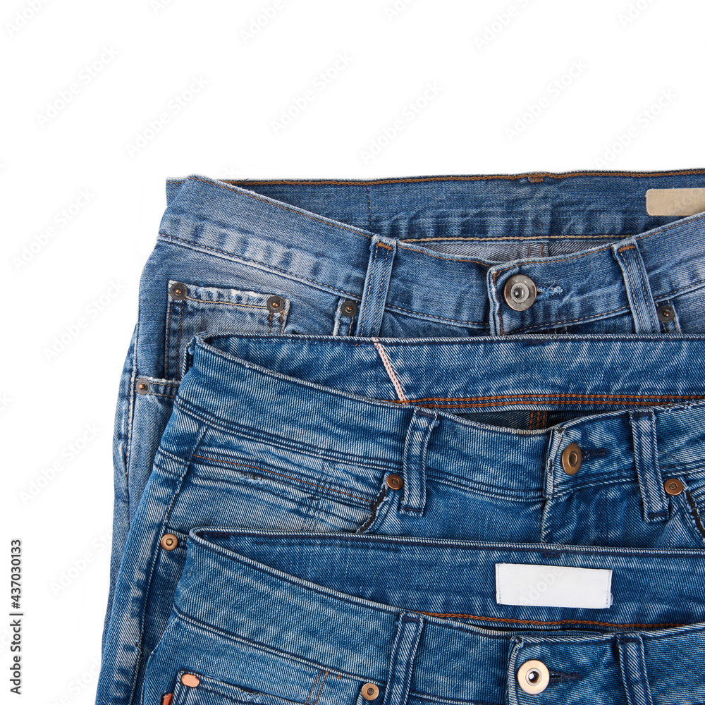 Stack of Various Shades Of Blue Jeans On White Background Denim jeans texture. Denim background texture for design. Canvas denim texture. Blue denim that can be used as background. Stack of Various Shades Of Blue Jeans On White Background Denim jeans texture. Denim background texture for design. Canvas denim texture. Blue denim that can be used as background.