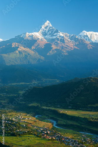 Annapurna at sunrise with river valley in foreground