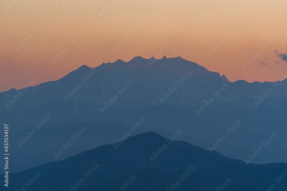 Sunset over the alps during spring near the city of Como, Italy - May 2021.