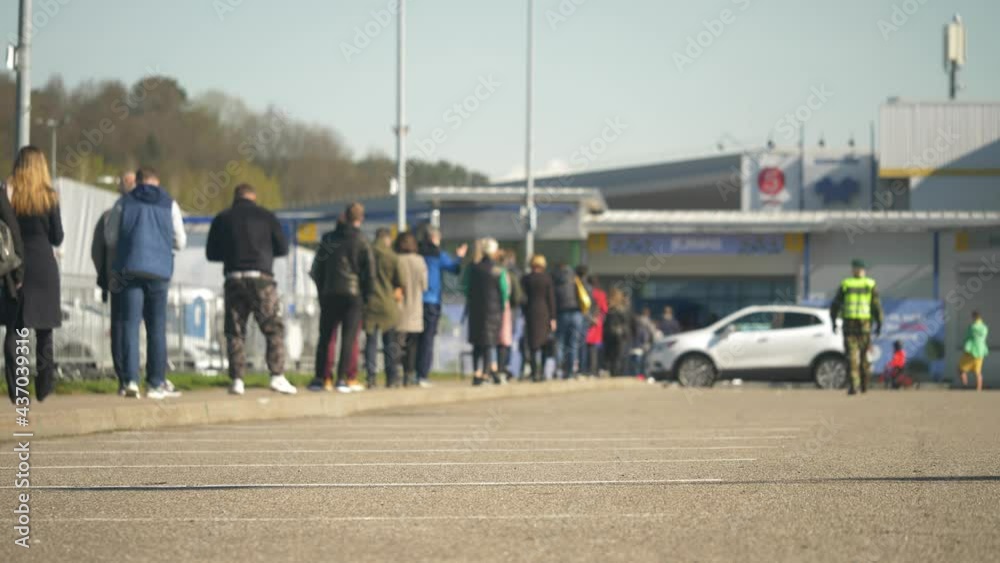 Morning. The people come to get their vaccine from covid-19. Everybody stand in the line and slowly moves forward for better tomorrow. Morning. The people come to get their vaccine from covid-19. Everybody stand in the line and slowly moves forward for better tomorrow.