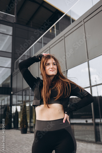 Fitness woman on stadium on summer