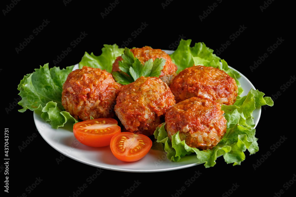 Appetizing meat balls in tomato sauce on a dark background. High protein dish. Appetizing meat balls in tomato sauce on a dark background. High protein dish.