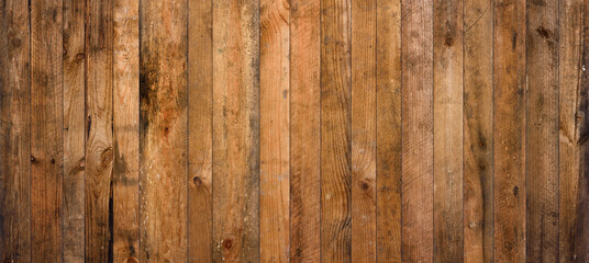 Old barn wood background texture. Vintage weathered rough planks wall backdrop.