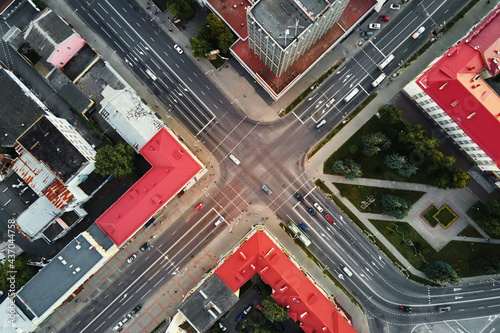 Cityscape of Gomel, Belarus. Aerial view of town architecture. Crossroad in city with cars traffic photo