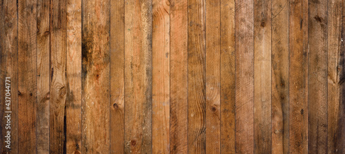 Old barn wood background texture. Vintage weathered rough planks wall backdrop.