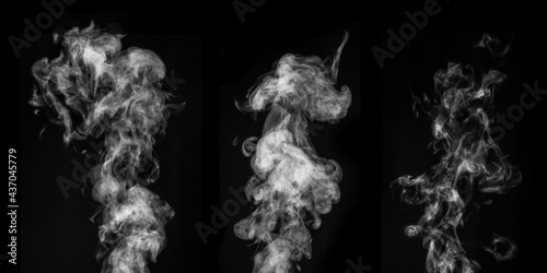 A perfect set of three different mystical curly white steam or smoke on a black background. Abstract background fog