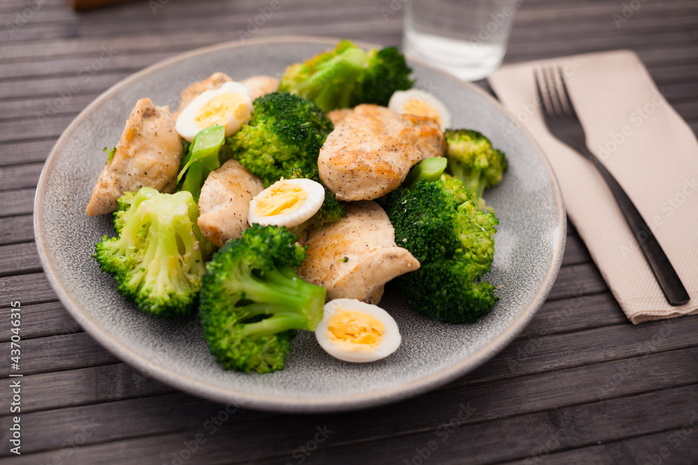healthy appetizer of chicken pieces with broccoli and quail eggs in bowl for healthy lunch healthy appetizer of chicken pieces with broccoli and quail eggs in bowl for healthy lunch