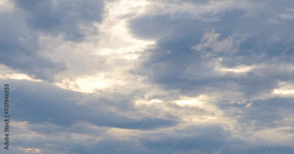 Large passenger airplane taking off against beautiful dramatic sunset. Plane taking off. Aircraft ascend towards colorful clouds. Static shot, real time Large passenger airplane taking off against beautiful dramatic sunset. Plane taking off. Aircraft ascend towards colorful clouds. Static shot, real time
