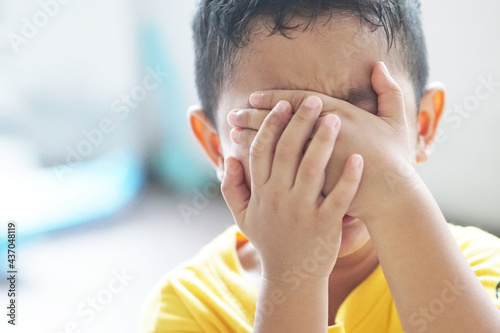 The Emotional Tantrum and Angry little Asian boy toddler complaining. Attention deficit hyperactivity disorder (ADHD) Concept. photo