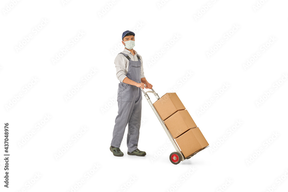 Delivery man and hand truck trolley style with brown cardboard colorful background. Delivery man and hand truck trolley style with brown cardboard colorful background.