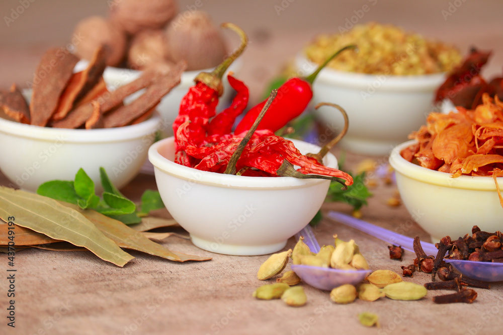 Variety of spice and herbs on table,dark and white table of colorful spices,Traditional Asian seasoning in white bowl,Indian spices HD footage Variety of spice and herbs on table,dark and white table of colorful spices,Traditional Asian seasoning in white bowl,Indian spices HD footage