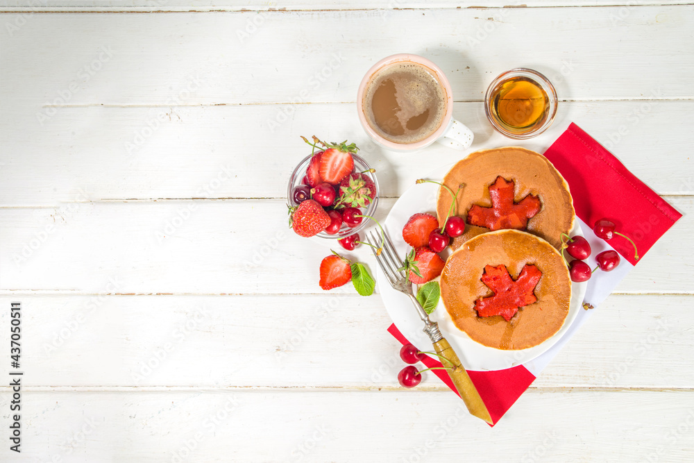 Canada Day concept, brunch menu background. Stack of red and white pancakes with maple leaf creative decoration, idea fod Canada Day breakfast food Canada Day concept, brunch menu background. Stack of red and white pancakes with maple leaf creative decoration, idea fod Canada Day breakfast food