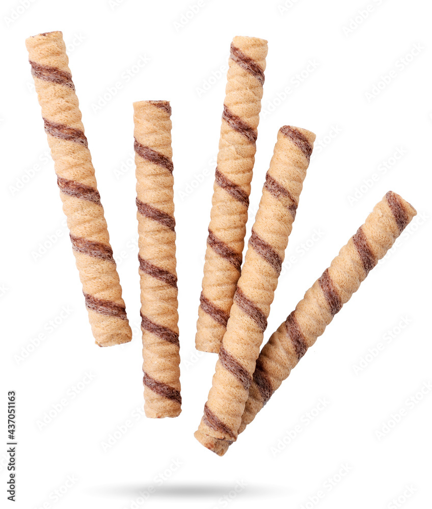 Wafer rolls are flying on a white background. Isolated Wafer rolls are flying on a white background. Isolated