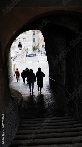 Beautiful old narrow stairs and arch on Italy street