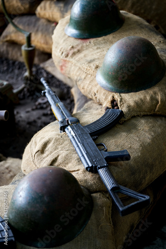 A close-up of the assault rifle model in the military summer camp