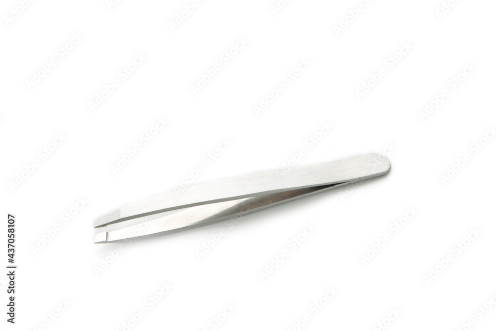 Metal eyebrow tweezers isolated on white background Metal eyebrow tweezers isolated on white background
