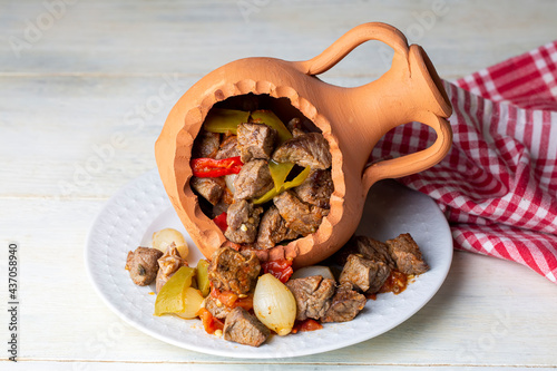 Authentic Turkish Testi Kebab cooked in earthenware waterjug, Turkish name; Testi kebabi photo