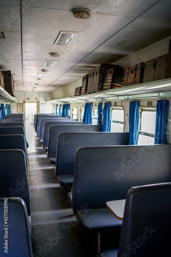 A close-up of the interior of an abandoned train passenger carriage seat