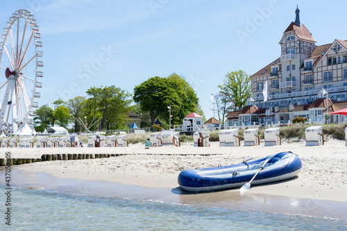 Dinghy on the summer beach of Kühlungsborn in Mecklenburg Western-Pomerania photo