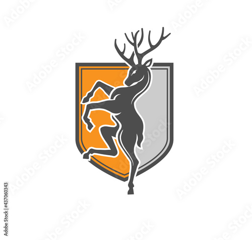 illustration of standing deer with colorful shield vector