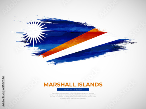 Grunge style brush painted Marshall Islands country flag illustration with constitution day typography